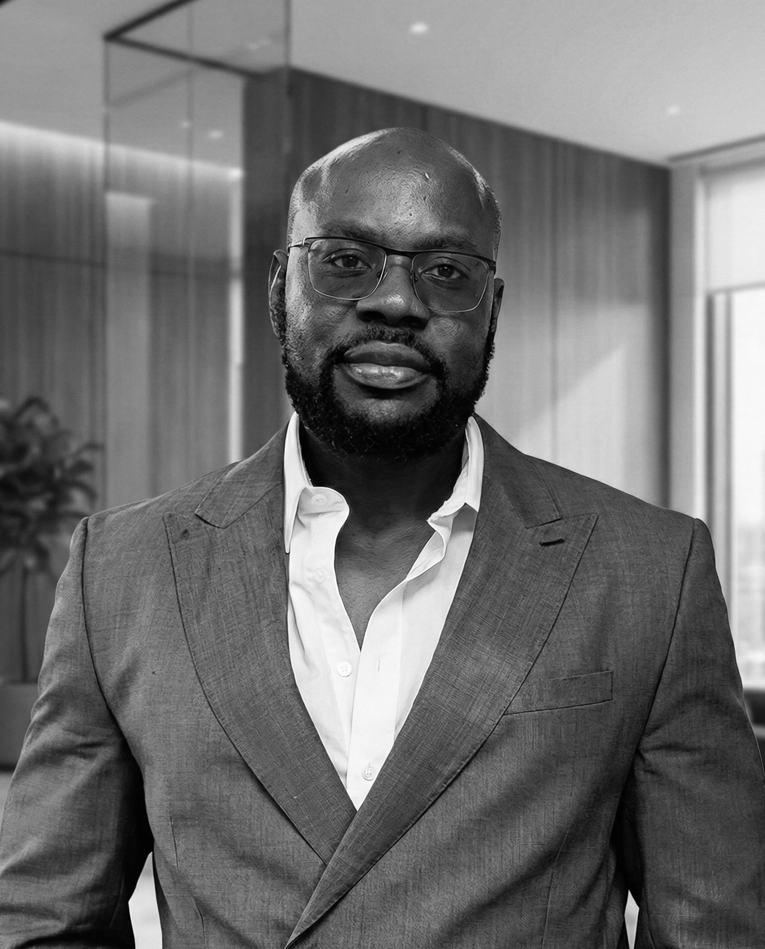 Portrait of Collins Che, Partner at TRAYT